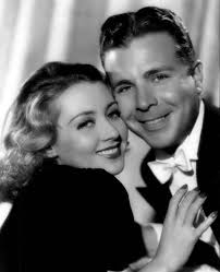 The caption is wrong: "Thorman" Powell is actually her son Norman, whose  father was her first husband George Barnes, but who was adopted by her  second husband Dick Powell when they married.