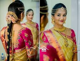 Besides delivering a look of elegance plus allowing you to wear your hair up, a bun will keep your manes in check and won't let them go and ruin your wedding look. Indian Bridal Hairstyles For Reception That Quintessential The Mingling Of Style And Traditions