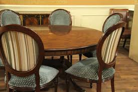 Keep centerpieces below eye level or less than 12 inches tall. Large 64 88 Inch Expandable Round Mahogany Dining Table