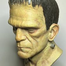 They'll be better compared after the right is finished with paint and hair,  but I wanted a side by side comparison of my 2 RZ Myers masks. Left was  sculpted by Russell