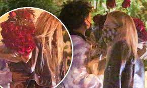 Cara shaved her head for the role but had colourful tresses on set in toronto, canada. Cara Delevingne Kisses Jaden Smith As He Gives Her A Huge Bouquet Of Roses On Valentine S Day Daily Mail Online