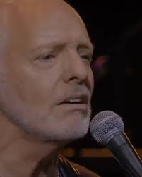 Peter Frampton and Eric Clapton with "While My Guitar Gently Weeps"