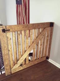 Most small pets including yorkshire terriers and cats often need a pet gate door. Diy Barn Door Baby Gate With Pet Door Instructions