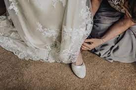 Some brides are passing up traditional gowns for elegant pants, the occasional groom is skipping the typical black tux for a pastel suit, and even bridesmaids are ditching the. What Shoes To Wear With Lace Wedding Dresses Wayfaring Weddings