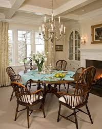 Glass and metal tables are too modern for the colonial style, so you should choose a wooden dining table and chairs. Santa Barbara Dutch Colonial Beach Style Dining Room Los Angeles By Kathryne Designs Inc Houzz
