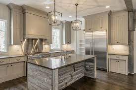 Filter, save & share beautiful farmhouse kitchen with gray cabinets remodel pictures, designs and ideas. Reclaimed Barn Wood Kitchen Island With Gray Quartz Countertop Cottage Kitchen