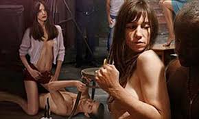 Shia LaBeouf is straddled by a brunette while Charlotte Gainsbourg goes  topless as stills from controversial real sex film Nymphomaniac emerge |  Daily Mail Online