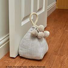 Cast iron owl door stoppers Door Stops Fabric Door Stop Egg Shell The Dove Factor