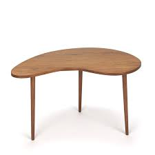 It features a free form shape which was quite revolutionary in the 1950's when it was produced. Kidney Shaped Vintage Teak Side Table Retro Studio