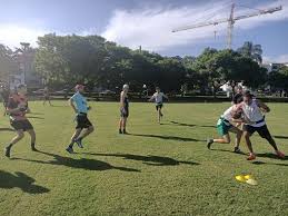 To play american football, divide players into 2 teams of 11 people each, with a quarterback for each team who will pass the ball to the other players at the start of each play. Casual Game Of Flag American Football New Farm Park Brisbane Norman 11 April 2021