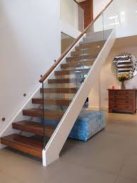 Thick Stair Treads Modern Staircase And Banister Glass Panel Railing Open Tread Open Tread Stair Open Tread Modern Staircase Modern Stairs Stair Railing Design Next, a modern open riser staircase was constructed to complement the contemporary design of an apartment complex clubhouse.