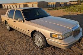 Image result for Ivory 1997 Town Car