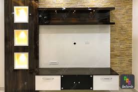 Design By Shwetha Living Room Tv Unit Stone Cladding Wall Tv Unit Design Tv Unit Design Wall Unit Designs