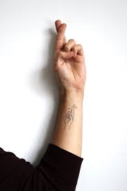 Jynx Tattoo Semi Permanent Tattoos By Inkbox Tattoos Minimalist Tattoo Fingers Crossed Tattoo