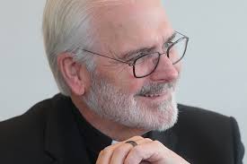 Chicago Catholic coalition sues ICE over denial of holy Communion, pastoral  care