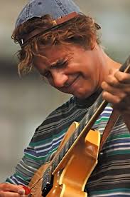 This is video by Kokoma Ika Atan. Eric Slavin performs with The Santa Fe  Guitar Quintet. A Letter From Home is a song composed by Pat Metheny.