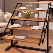Pullout desk shelves you can make. Convertible Shelf Transforms Into A Dining Table This Transforming Dining Table Is Perfect For Small Spaces