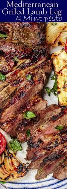 Mediterranean Grilled Lamb Recipe With Mint Pesto The Mediterranean Dish Garlic Herb Marinated Leg Of Lamb T Grilled Lamb Recipes Lamb Recipes Grilled Lamb