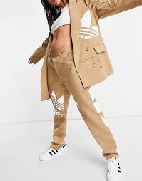 Adidas x dry clean only logo print trench coat | browns. Adidas Originals X Dry Clean Only Tailored Trousers In Beige With Trefoil Tee Inserts Monroe Clothing