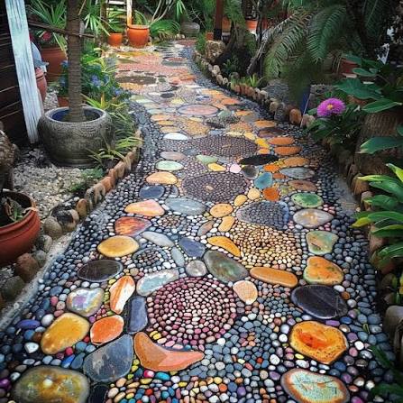 Stunning pebble mosaic pathway, adding such a unique touch to the garden!  Makes me want to take a leisurely stroll. &eth;&para;&acirc;&acirc;&iuml;&cedil;