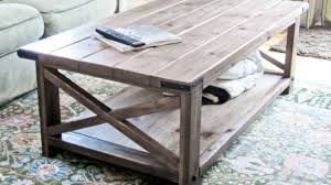 Turn a recycled pallet into a modern and functional coffee table that includes wheels for easy mobility! Coffee Tables Ana White