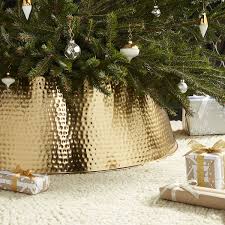 The metal tree collar is a whole. Bash Silver Christmas Tree Collar Reviews Crate And Barrel Christmas Tree Base Christmas Tree Stand Cover Christmas Tree Stand