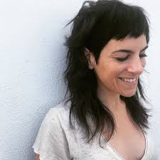 Does anyone know any hairdressers that specialise in shaggy mullets for  women, kind of looking for someone who can do something similar as in the  photo ?