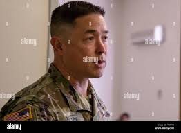 Command Sgt. Major Stephen Helton of 7th Infantry Division discusses an  upcoming mission with 1st Sgt. Justin Estelle of Charger Company, 1st  Battalion, 5th Infantry Regiment, 1st Stryker Brigade Combat Team, 25th