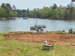 This lot is just over.5 acre situated on lake murray in the beautiful plantation pointe subdivision. Land For Sale On Lake Murray