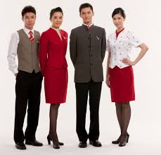 2011 Current The New Uniform Once Again Created By Renowned Hong Kong Designer Eddie Lau Continue Flight Attendant Uniform Cathay Pacific Flight Attendant