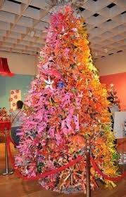 Pin By Heather Mann Dollar Store Cra On Holiday Christmas Plastic Bottle Flowers Recycled Crafts Alternative Christmas Tree