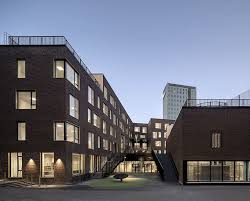 European School Copenhagen Clad With Red Bricks Reflects Its Historical Context Roof Landscape Architecture Landmark Architect