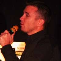 Comedian Patrick Tyrrell performs stand-up comedy during