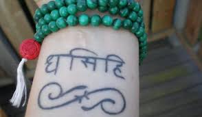 Images engraved on both sides. Tattoo Symbols 35 Sleek Sanskrit Designs Design Press