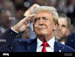 Eric Trump, right, the son of Donald Trump, and Katrina Campins leave the  South Beach mansion that once belonged to Gianni Versace, after it was sold  for the winning bid of $41.5