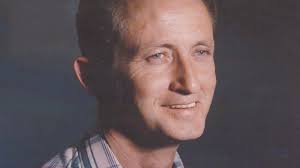 Robert “Buck” Wayne Rush