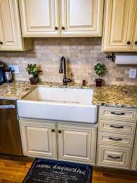 French Kitchen Farmhouse Sink Cream Cabinets Mini Chandelier Cream Granite Center I Trendy Kitchen Backsplash Trendy Farmhouse Kitchen New Kitchen Cabinets