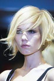 Short Bob With Long Pieces In The Front Short Hair Styles Medium Hair Styles Short Hair Styles For Round Faces
