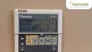 An outdoor unit is positioned in a discreet location outside your home. How To Change The Time And Day On A Daikin Air Conditioning Controller Youtube