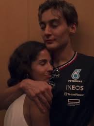 George Russell Helping Carmen Out of The Boat