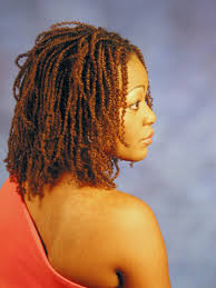 The transitioning hair that is neither short nor long enough can look awkward when undone, while being knotted, it make a classy hairstyle. Pin On Locs Braids And Twists