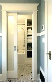 Bordered in white color scheme, this door looks contrast with beige wall paint. 22 Ravishing Bathroom Door Ideas You Should Try