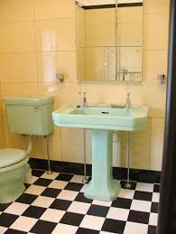Art Deco Bathroom With Yellow Vitrolite Walls And Green Fixtures Art Deco Bathroom Retro Bathrooms Art Deco Bathroom Tile