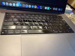 MacBook keys eventually wear down from ...