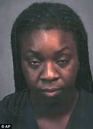 Suicide: Tonya Thomas, seen in a a 2002 mug, shot her children a total of 18 times, an autopsy report shows - article-0-131B78D7000005DC-164_306x423