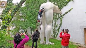 Walking along the bank to the river in prague, taking in the beautiful sunrise and surrounding statues i turned into a kind of yard area and. The Modern Art Of David Cerny In Prague Livingprague Com