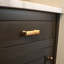 The surrounding cabinets are dark oak and we also have tall cedar cathedral ceiling in the fr. Sherwin Williams Sealskin Vs Urbane Bronze Novocom Top