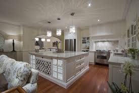 An open plan kitchen and living area was created in this queenslander. Hampton Traditional Queenslanders