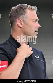 Head Coach Robin Veldman of Club NXT and Kaye Furo (87) of Club NXT  pictured during a soccer game between Club Brugge NXT and KSC Lokeren Temse 