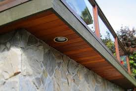 Install Soffit And Fascia For Beautify Your Exterior Design Fantastic Stone Siding With Wood Soffit And Stone Siding Exterior Color Palette Recessed Lighting